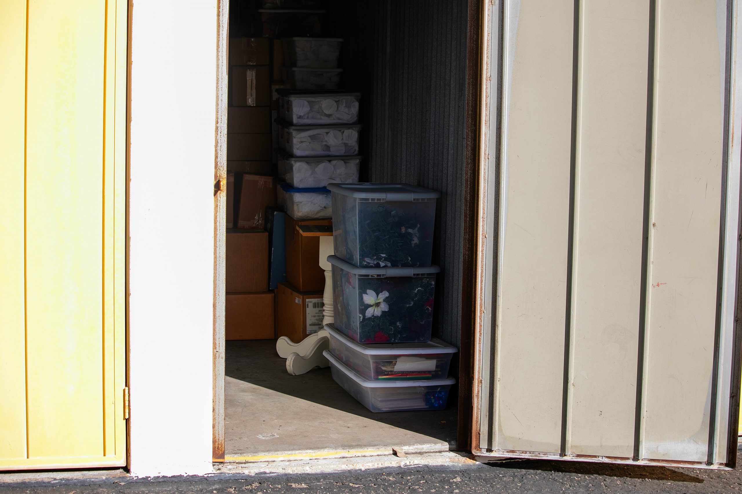 self storage interior with boxes and shelves